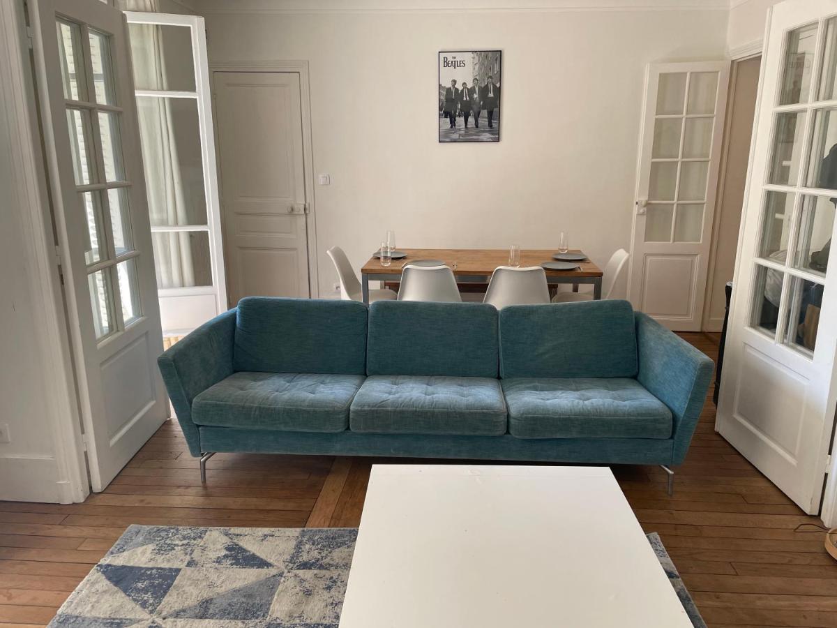 Appartement Tour Eiffel Paris Bagian luar foto